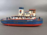 a toy boat that is sitting on a table