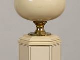 a lamp that is sitting on a wooden table