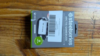 a box with a barcode on it sitting on a wooden table