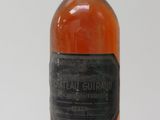 a bottle of alcohol that is sitting on a table