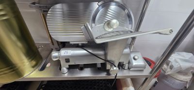 a machine that is sitting on a shelf in a kitchen