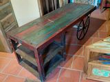 a wooden table and a wooden bench in a room