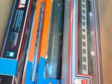 a box with a train set in it and a box with a train set in it