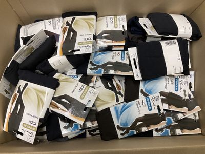 a cardboard box full of men ' s black and white socks