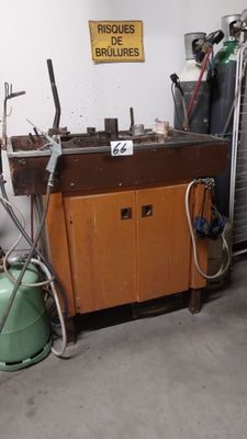 a garage with a lot of tools and equipment in it