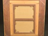 a close up of a picture frame on a black background