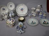 a table with a lot of china on it