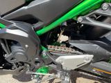 a close up of a motorcycle with a chain attached to it