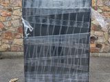 a chalk board on a pallet outside of a building