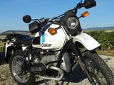 a motorcycle that is parked on the side of the road