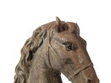 a statue of a horse head on a white background