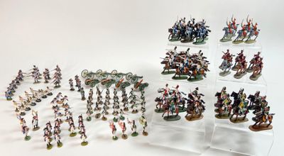 a lot of figurines that are sitting on a table
