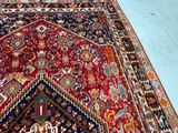 a large oriental rug on the floor in a room