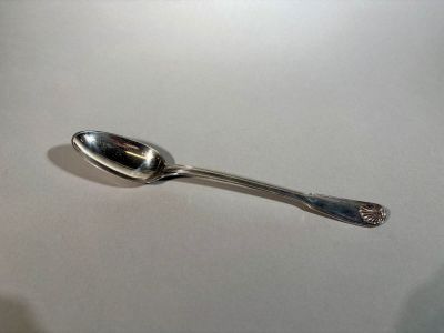 a spoon that is sitting on a table