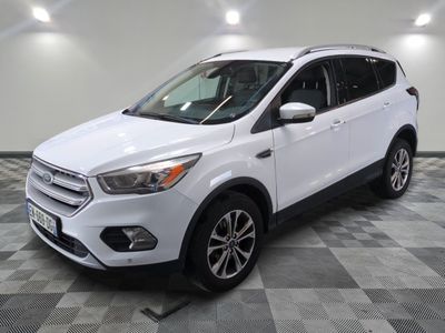 a white ford escape is parked on a checkered tile floor