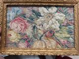a picture of a picture of a picture of flowers in a gold frame