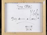 a white board with writing on it sitting on a easel