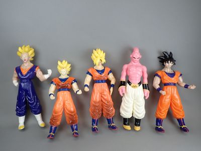 dragon ball action figures are lined up in a row