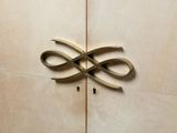 a wooden door with a decorative design on it