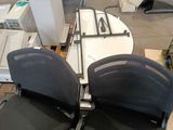 two chairs that are sitting in a room