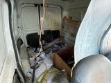 an image of a van with a bunch of items in the back