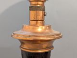 a lamp that is sitting on top of a table