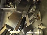 a lot of kitchen utensils that are in the sink