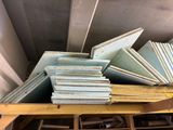 many pieces of wood stacked on top of each other