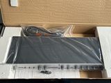 a box with a laptop in it sitting on a table
