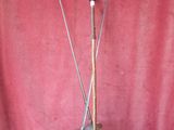 two swords on a red cloth with a stethoscope on it