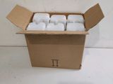 a box of coffee cups sitting on a table