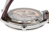 an image of a close up of a watch on a white surface