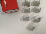 a box of paper clips next to a pair of scissors
