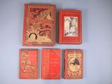 four books on the wall with pictures on them