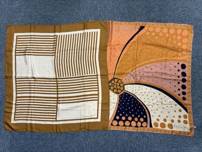 a close up of a piece of cloth with a design on it