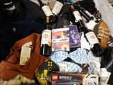 a lot of items that are sitting on a bed