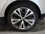 a close up view of a car ' s wheel on the floor