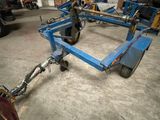 an image of a blue cart in a garage