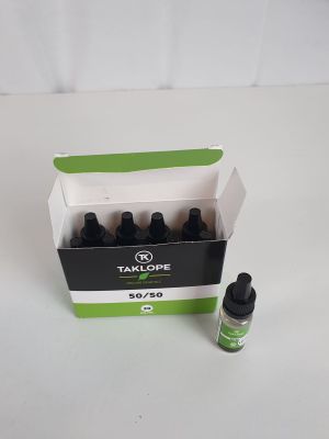 un flacon d'huile de CBD à côté d'une boîte d'huile de CBD