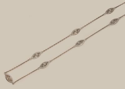 a pair of diamond - set chain necklaces