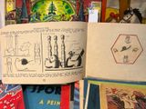 a lot of books that are on a table