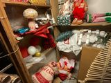a small room with a lot of stuff on the shelves