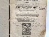 an open book with a picture of a man on it