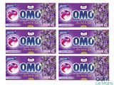 quatre paquets de lessive Om à la lavande, à la lavande