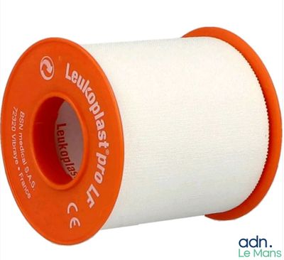 an orange and white spooled thread with a spool of thread