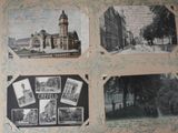 pictures of old buildings on the wall of this room