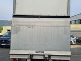 a white truck that is parked in a parking lot