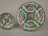 two chinese famille plates and a saucer
