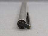 a close up of a metal object on a table