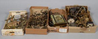 several boxes of assorted items sitting on top of a white surface
